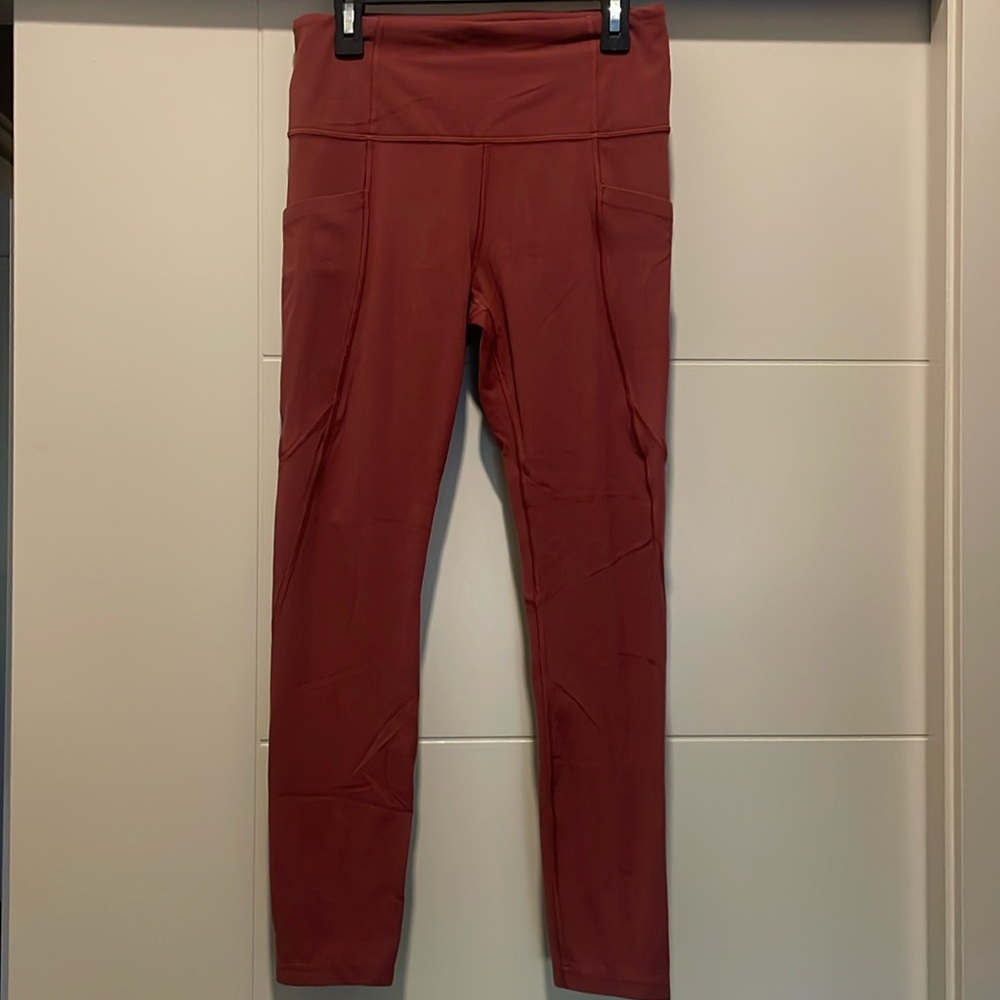 Athleta Salutation Stash Tight